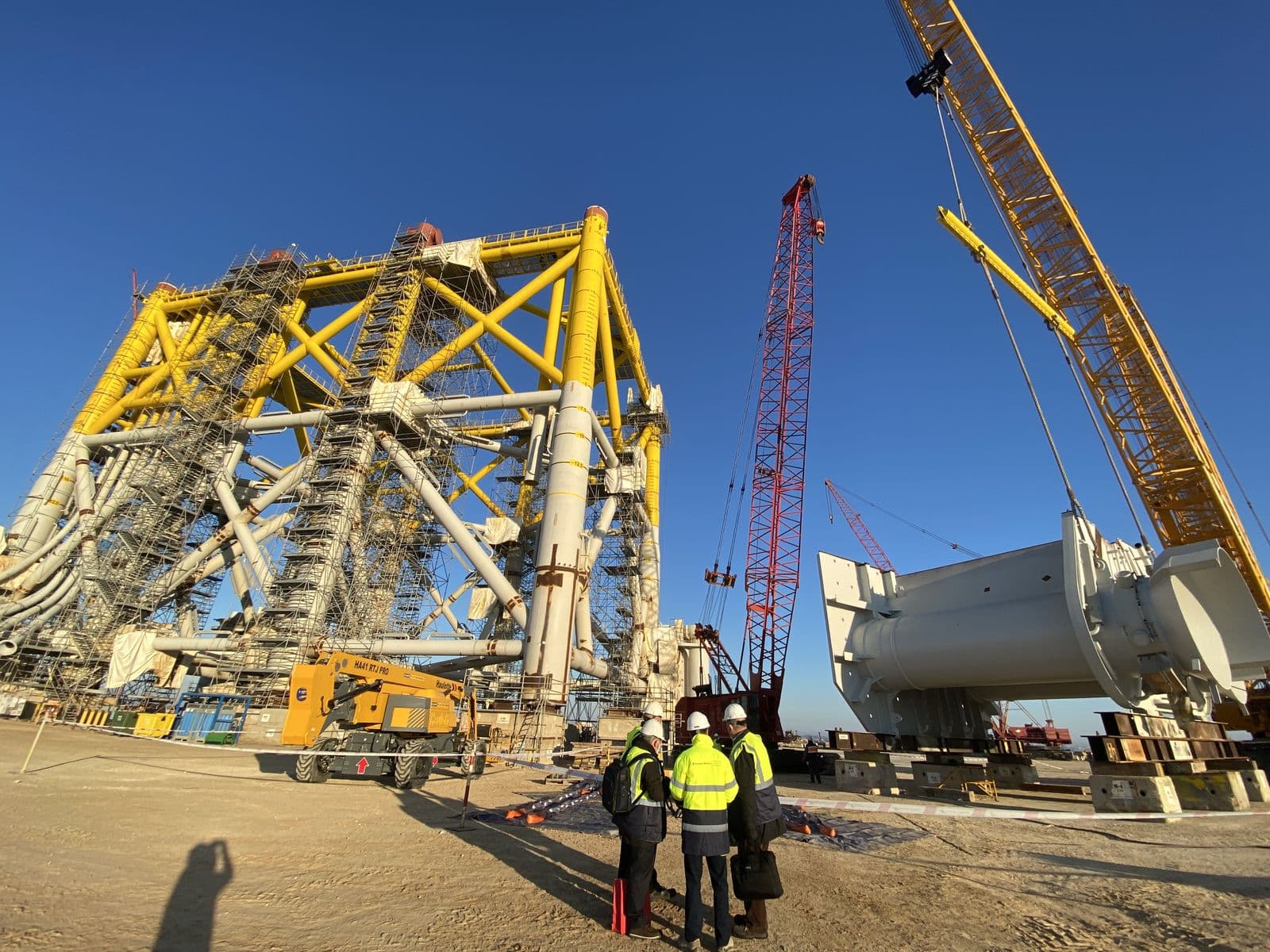 Industrial crane at sunset